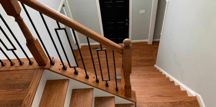 Small Changes Make A Big Difference: Newel Posts, Handrails, and Iron Balusters